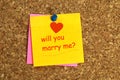 Will you marry me postit on cork Royalty Free Stock Photo