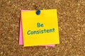 be consistent postit on corkboard Royalty Free Stock Photo