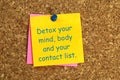 detox your mind, body and your contact list postit on corkboard