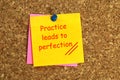 practice leads to perfection postit on corkboard Royalty Free Stock Photo