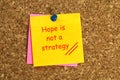 hope is not a strategy postit on corkboard Royalty Free Stock Photo
