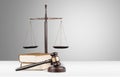 Justice Scales, gavel and books on light Royalty Free Stock Photo