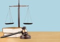 Justice Scales, gavel and books on light Royalty Free Stock Photo