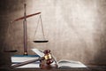 Justice Scales, gavel and books on light Royalty Free Stock Photo