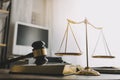 Justice and law concept.Male judge in a courtroom with the gavel, working with, computer and docking keyboard, eyeglasses, on Royalty Free Stock Photo