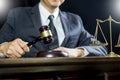 justice and law concept.Male judge in a courtroom working on wood table with documents., attorney court judge justice gavel legal Royalty Free Stock Photo