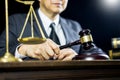 justice and law concept.Male judge in a courtroom working on wood table with documents., attorney court judge justice gavel legal Royalty Free Stock Photo