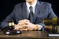 justice and law concept.Male judge in a courtroom working on wood table with documents., attorney court judge justice gavel legal Royalty Free Stock Photo