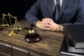 justice and law concept.Male judge in a courtroom working on wood table with documents., attorney court judge justice gavel legal Royalty Free Stock Photo