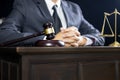 Justice and law concept.Male judge in a courtroom working on wood table with documents., attorney court judge justice gavel legal Royalty Free Stock Photo