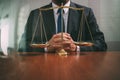 justice and law concept.Male lawyer in the office with brass scale on wooden table,reflected view Royalty Free Stock Photo