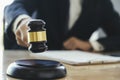 Male lawyer in the office with brass scale Royalty Free Stock Photo