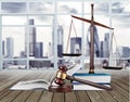 Justice Scales, books and gavel on wooden table Royalty Free Stock Photo