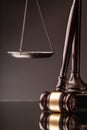 Justice Scales and wooden gavel on wooden table Royalty Free Stock Photo