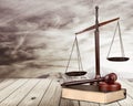 Justice Scales and wooden gavel on wooden table Royalty Free Stock Photo