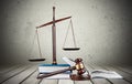 Justice Scales, gavel and books on light Royalty Free Stock Photo