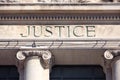 Justice sign on a Courthouse Building, close up Royalty Free Stock Photo