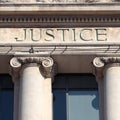 Justice sign Courthouse Building front exterior square format Royalty Free Stock Photo