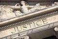 Justice sign on a Courtroom Building, close up Royalty Free Stock Photo