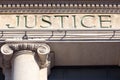 Justice sign on a Courtroom Building, law courts