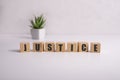 JUSTICE word made with building blocks on white Royalty Free Stock Photo