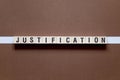 Justification word concept on cubes Royalty Free Stock Photo