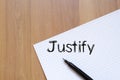 Justify write on notebook Royalty Free Stock Photo