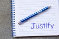 Justify write on notebook Royalty Free Stock Photo