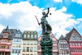 Lady Justice in front of RÃÂ¶merberg Ostzeile buildings in Frankfurt, Germany Royalty Free Stock Photo