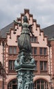 Justitia - Lady Justice sculpture on the Roemerberg square in Frankfurt, Germany Royalty Free Stock Photo