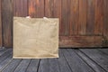 Jute bag on wooden floor with space on wood background Royalty Free Stock Photo