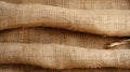 Jute hessian sackcloth canvas woven texture pattern background in light beige cream brown color blank empty. Royalty Free Stock Photo