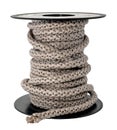 Jute rope is wound on a plastic spool on a white background. Rope isolate Royalty Free Stock Photo