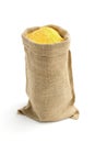 Jute sack full of corn flour Royalty Free Stock Photo