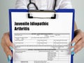 Juvenile Idiopathic Arthritis sign on the piece of paper Royalty Free Stock Photo