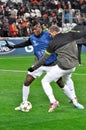 Juventus football players warm up during a training session