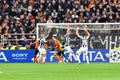 Juventus players raise their hands at the gate