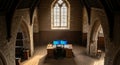 Old church converted into modern office with dual computer monitors and desk Royalty Free Stock Photo