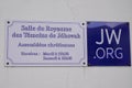 Jw.org kingdom hall of jehovah witnesses french text and brand logo on room building