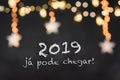 2019 jÃÂ¡ pode chegar in a black background with blurred lights and stars