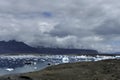 JÃÂ¶kulsÃÂ¡rlÃÂ³n glacier lagoon in dramatic light, Iceland