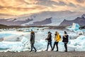 JÃÂ¶kulsÃÂ¡rlÃÂ³n, Iceland - Nov 1st 2017 - Tourists and locals enjoying the JÃÂ¶kulsÃÂ¡rlÃÂ³n iceberg lagoon with glacier in the