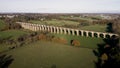 4K aerial footage of a local passenger train on Crimple valley Viaduct near Harrogate in UK