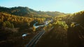 8k aerial panoramic landscape view of a scenic road in Canadian Mountains