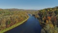 Bridge over the river, autumn forest Sigulda city nature, Gauya, 4K drone flight, bridge car drive from above