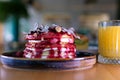 4K Closeup view of Stack of pancakes with chocolate, honey, strawberry, blue berry on top in plate, delicious dessert