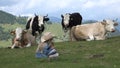 4K Cowherd Child Pasturing Cows, Farmer Girl Smelling Flowers on Grass Meadow