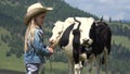 4K Farmer Shepherd Child with Grazing Cows, Cowherd Girl with Cattle in Mountain