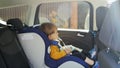 4k video of adorable baby boy sitting in child car safety seat