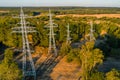 High voltage tower. High voltage. Electricity transmission power lines at sunset (high voltage pylon). Aerial view Royalty Free Stock Photo